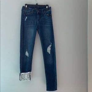 Girls dark wash ripped skinny jeans w/ lace cuffs